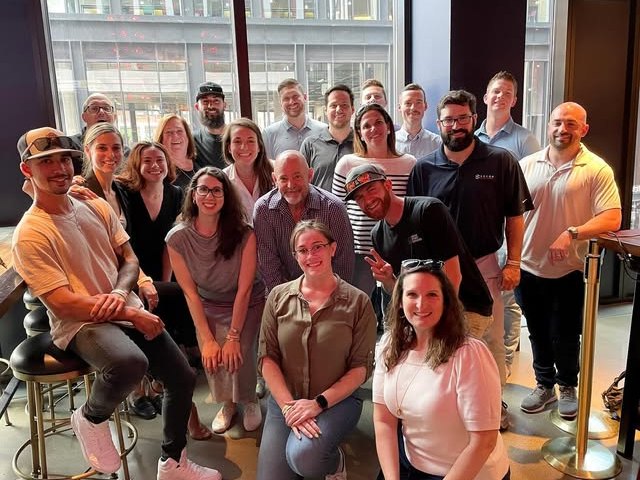 SM CRE Services team members volunteering and together at company events